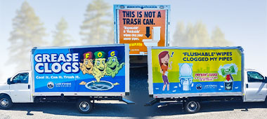 Truck signs "Grease Clogs" "This not a Trash Can" "Flushable Wipes Clogged my Pipes" promo for blog article